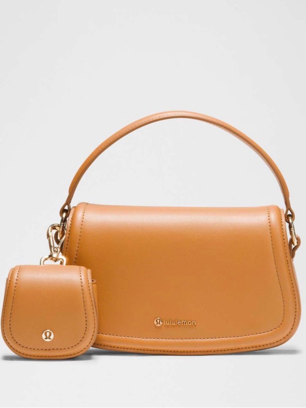 Lululemon Leather Alternative Mini Bag 1.2L
Chestnut Brown / Gold